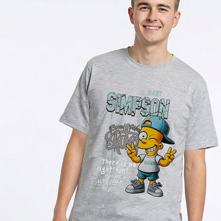 Person wearing a gray t-shirt with cartoon character and text, standing next to the shirt on a white background.